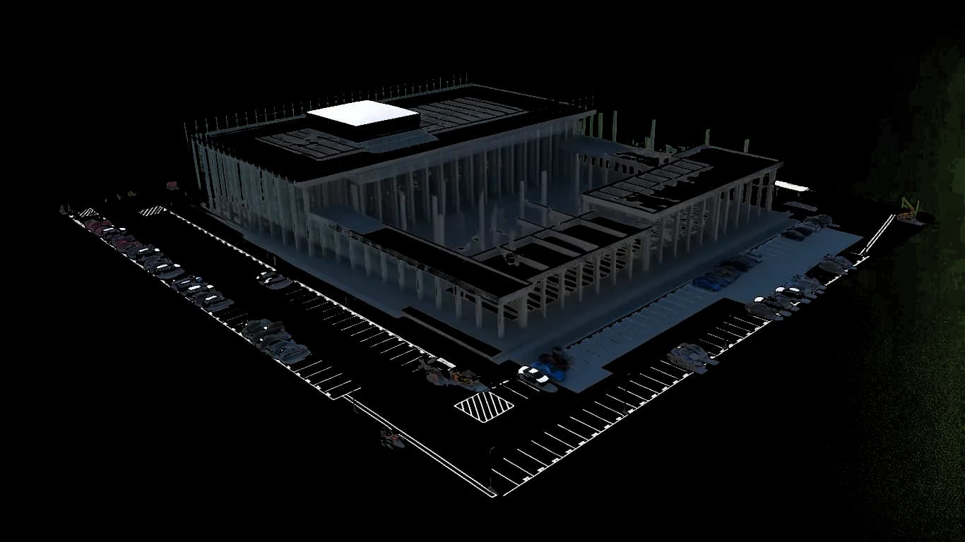 Pre-engineered metal building under construction with steel framing and partial exterior panels